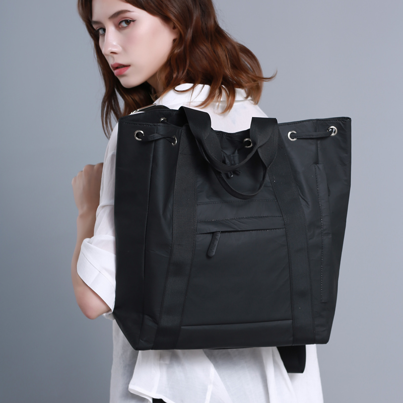 Sac à dos Tyvek polyvalent noir pour femme : convertible, léger et élégant – Parfait pour le travail et l'université