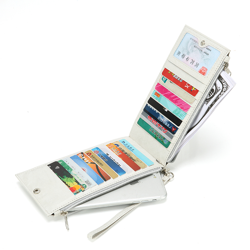Portefeuille Tyvek RFID pour femme, revêtement en cuir PU, porte-cartes de crédit grande capacité et porte-monnaie avec poches zippées sécurisées.